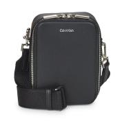 Handtasje Calvin Klein Jeans CK SLEEK REPORTER XS