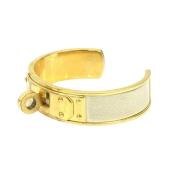 Pre-owned Metal bracelets Hermès Vintage , Yellow , Dames