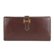 Tweedehands portemonnees Hermès Vintage , Brown , Unisex