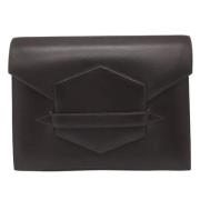 Pre-owned Leather clutches Hermès Vintage , Brown , Dames