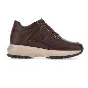 Tijdloze iconische bruine sneakers Hogan , Brown , Dames