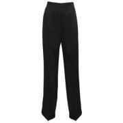 Pre-owned Wool bottoms Saint Laurent Vintage , Black , Dames