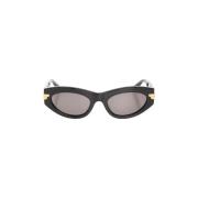 Zwarte Cat-Eye Zonnebril met Gouden Accenten Bottega Veneta , Black , ...