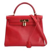 Pre-owned Leather shoppers Hermès Vintage , Red , Dames