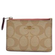 Pre-owned Coated canvas wallets Coach Pre-owned , Beige , Dames
