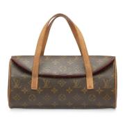 Pre-owned Leather handbags Louis Vuitton Vintage , Brown , Dames