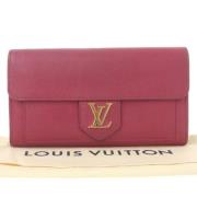 Pre-owned Leather wallets Louis Vuitton Vintage , Red , Dames