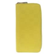 Pre-owned Canvas wallets Louis Vuitton Vintage , Yellow , Dames