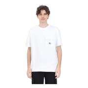 Witte T-shirt met gestructureerd patroon en logo knoop Calvin Klein Je...