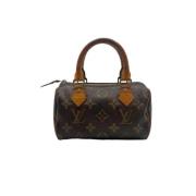 Pre-owned Canvas handbags Louis Vuitton Vintage , Brown , Dames