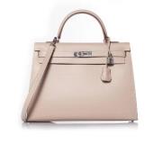 Pre-owned Leather handbags Hermès Vintage , Beige , Dames