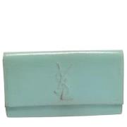 Pre-owned Leather clutches Yves Saint Laurent Vintage , Blue , Dames