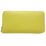 Pre-owned Leather wallets Hermès Vintage , Yellow , Dames