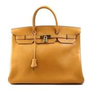 Pre-owned Leather handbags Hermès Vintage , Beige , Dames