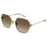 Goud/bruin getinte zonnebril Gucci , Yellow , Dames