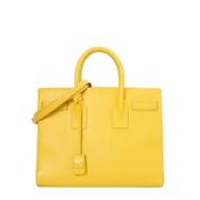 Pre-owned Leather handbags Yves Saint Laurent Vintage , Yellow , Dames