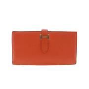 Pre-owned Leather wallets Hermès Vintage , Orange , Dames