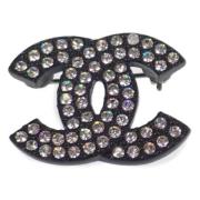 Pre-owned Metal brooches Chanel Vintage , Black , Dames