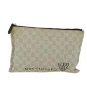 Pre-owned Canvas clutches Gucci Vintage , Beige , Dames