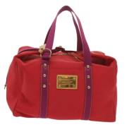 Pre-owned Canvas handbags Louis Vuitton Vintage , Red , Dames