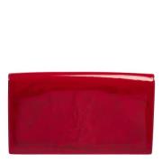 Pre-owned Leather clutches Yves Saint Laurent Vintage , Pink , Dames