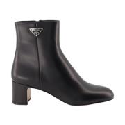 Leren enkellaarzen met metalen logo Prada , Black , Dames