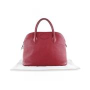 Pre-owned Leather handbags Hermès Vintage , Red , Unisex