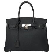 Pre-owned Leather handbags Hermès Vintage , Black , Dames