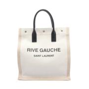 Pre-owned Leather handbags Yves Saint Laurent Vintage , Beige , Dames