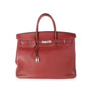 Pre-owned Leather handbags Hermès Vintage , Red , Dames