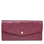 Pre-owned Leather wallets Louis Vuitton Vintage , Red , Dames