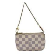 Pre-owned Canvas clutches Louis Vuitton Vintage , Beige , Dames