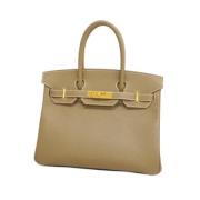 Pre-owned Leather handbags Hermès Vintage , Beige , Dames