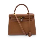 Pre-owned Leather handbags Hermès Vintage , Brown , Dames