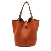 Pre-owned Leather totes Hermès Vintage , Orange , Dames