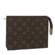 Pre-owned Canvas pouches Louis Vuitton Vintage , Brown , Dames