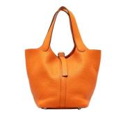 Pre-owned Leather handbags Hermès Vintage , Orange , Dames