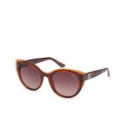 Moderne ronde zonnebril in bruin Guess , Brown , Dames