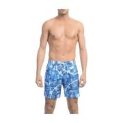 Elegante blauwe zwemshorts met allover print Bikkembergs , Multicolor ...