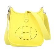 Pre-owned Fabric shoulder-bags Hermès Vintage , Yellow , Dames