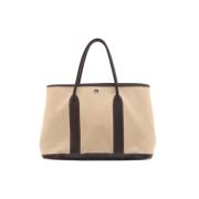 Pre-owned Canvas handbags Hermès Vintage , Beige , Dames