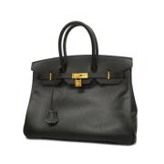 Pre-owned Fabric handbags Hermès Vintage , Black , Dames