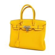 Pre-owned Fabric handbags Hermès Vintage , Yellow , Dames