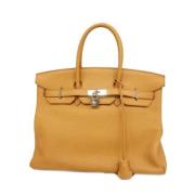 Pre-owned Fabric handbags Hermès Vintage , Yellow , Dames