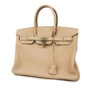 Pre-owned Fabric handbags Hermès Vintage , Beige , Dames