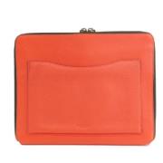 Pre-owned Leather clutches Coach Pre-owned , Orange , Heren