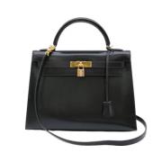 Pre-owned Fabric handbags Hermès Vintage , Black , Dames