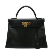 Pre-owned Fabric handbags Hermès Vintage , Black , Dames