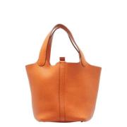 Pre-owned Fabric handbags Hermès Vintage , Orange , Dames