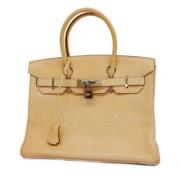 Pre-owned Fabric handbags Hermès Vintage , Beige , Dames